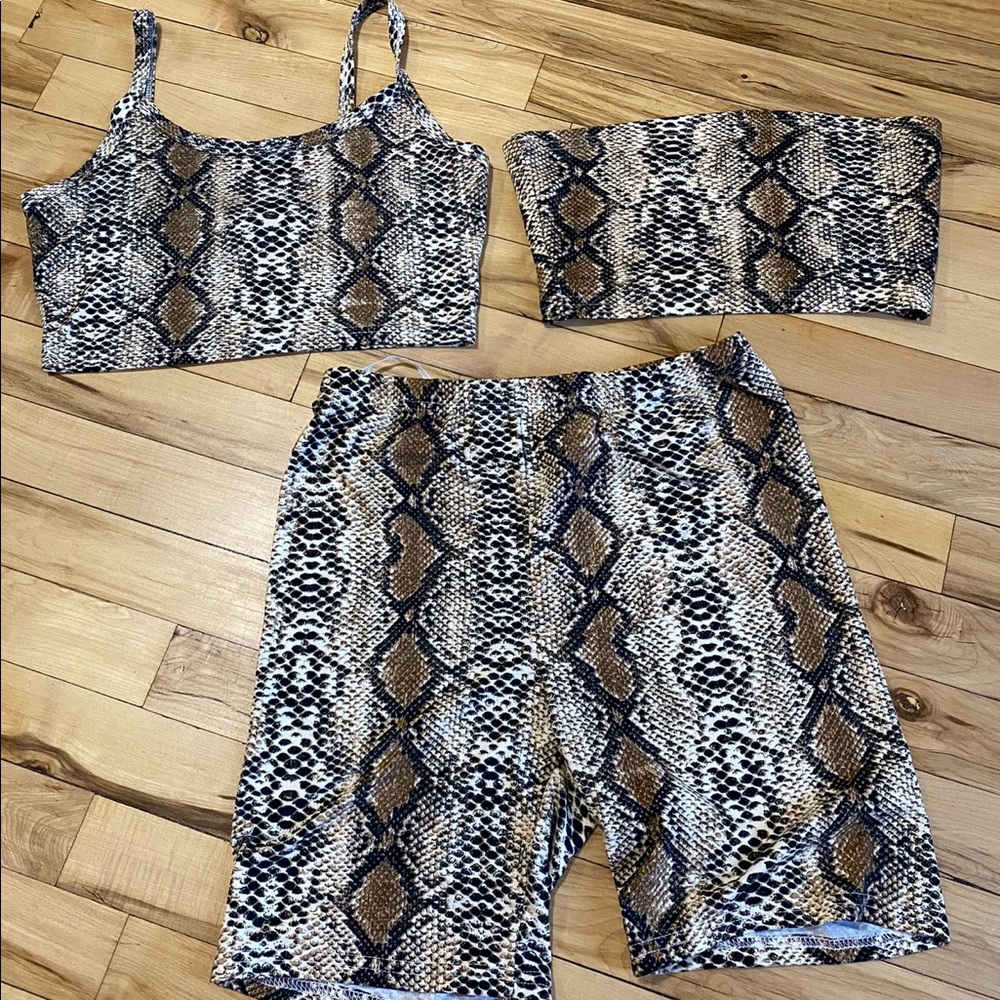 A brand new 3 piece snake skin set